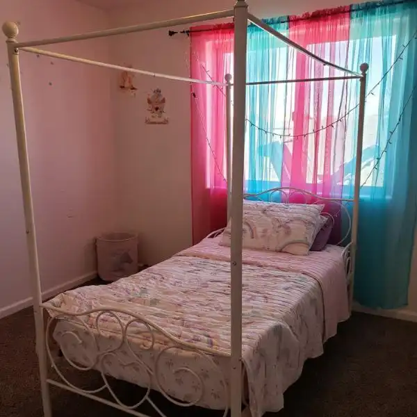 Best Choice Products 4-Post Metal Canopy Bed has Built-in Curtain Rods