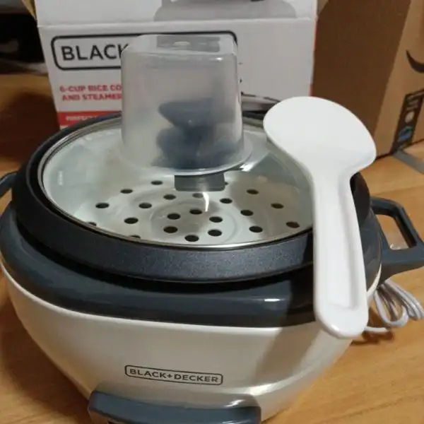 BLACK+DECKER 2-in-1 Rice Cooker
has Measuring Cup and Spoon Included